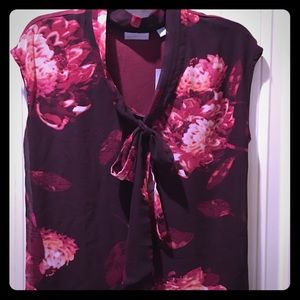 New York and Company sleeveless tie front shell.